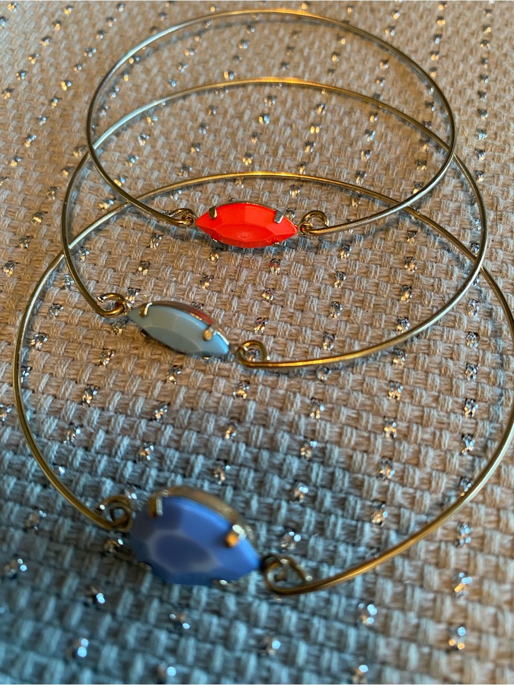 Gold-Tone Stackable Bangle Bracelets with Red, Gray, and Purple Stones